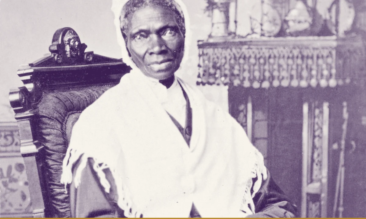 A seated studio portrait of Sojourner Truth in a shawl and white cap.