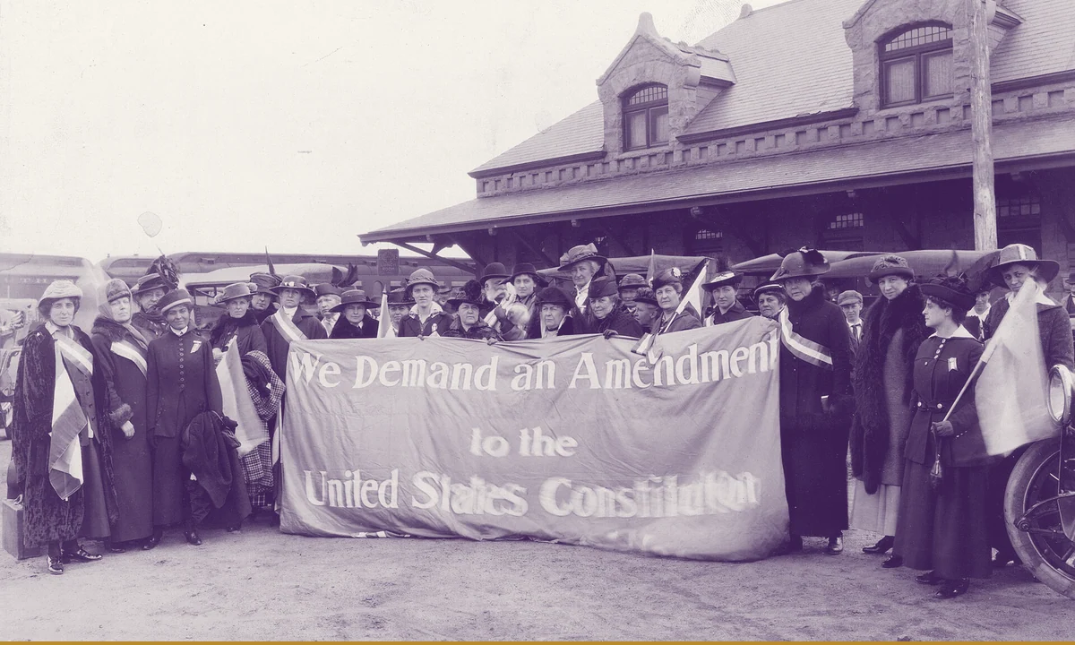 Campaigners beside a railway carriage used for a speaking tour.