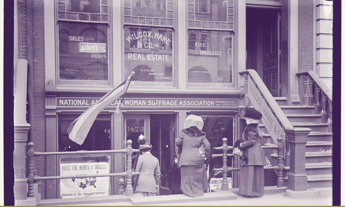 The street front of an office serving as a suffrage association headquarters.
